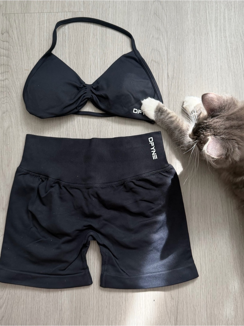 DFyne black impact sports bra and shorts set